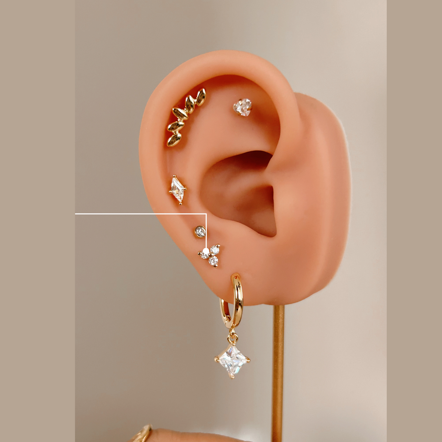 Triple Bloom Cubic Zirconia Studs | Broqueles Flor Triple Circonia